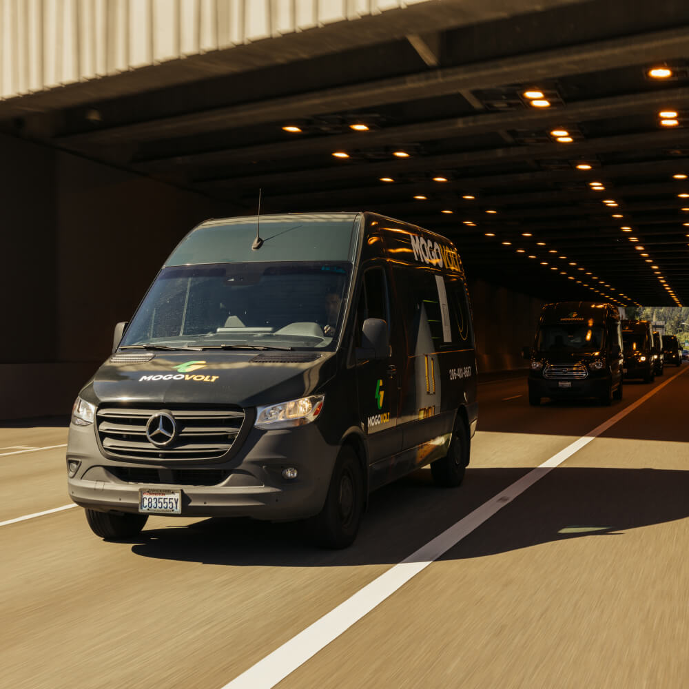 Mogovolt service vans traveling together